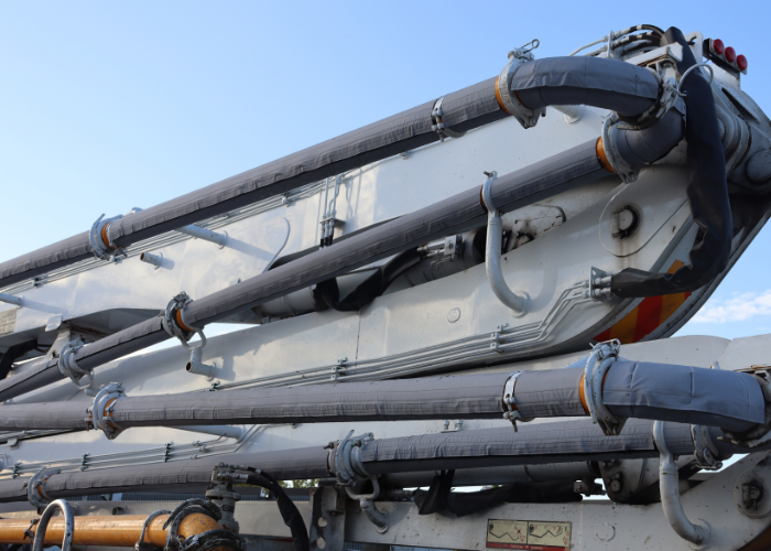 Boom pipe wrap application on boom pipe