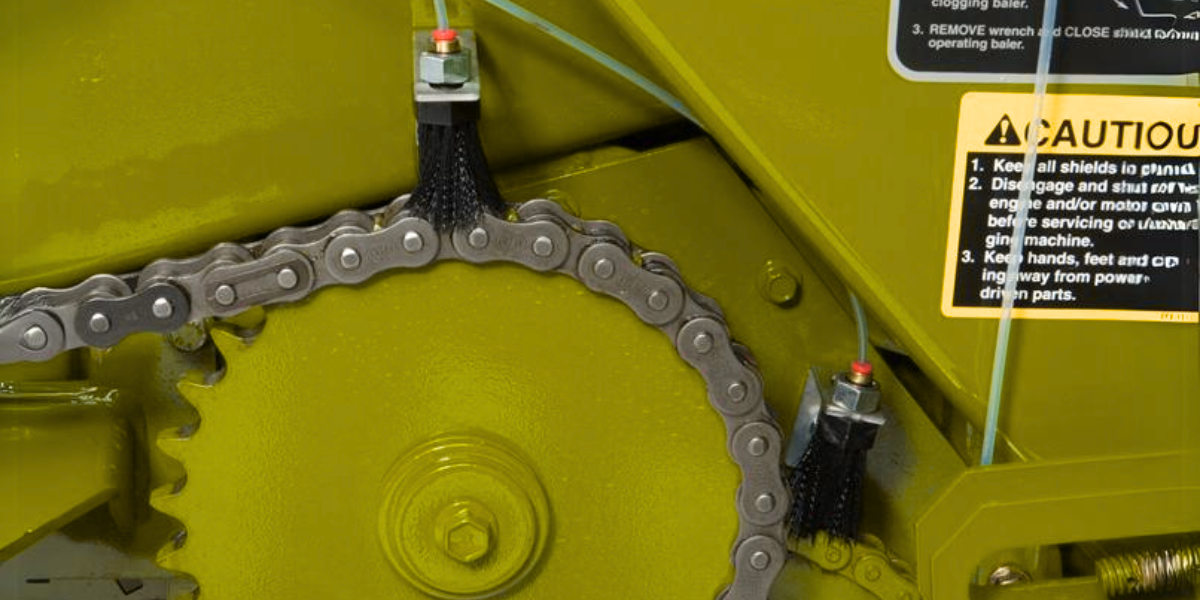 Lubeminder brushes on yellow chains