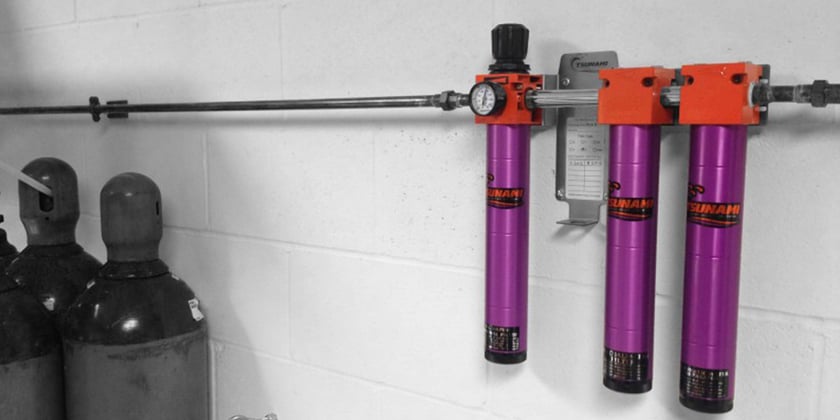 Three stage compressed air filtration installed in shop